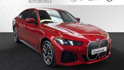 Fire red metallic Gebraucht 2025 BMW i4 Comfort Edition Limousine | 46.300 € (Superpreis)