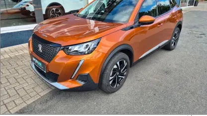 Gebraucht Peugeot 2008 Allure 131 PS (96 kW) 2020 Orange fusion met SUV