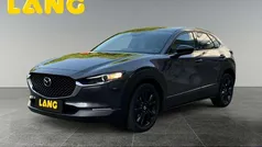 Machine gray (metallic) Gebraucht 2024 Mazda CX-30 Homura-Line SUV | 26.990 € (Fairer Preis)