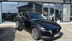 Jet black Gebraucht 2023 Mazda CX-30 Exclusive SUV | 27.800 € (Fairer Preis)
