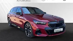 Fire red metallic Gebraucht 2024 BMW i5 Comfort Edition Limousine | 70.490 € (Guter Preis)