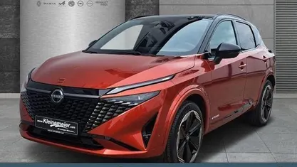 Reddish orange/black Gebraucht 2024 Nissan Qashqai Comfort SUV | 33.580 € (Fairer Preis)