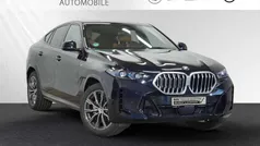 Carbonschwarz metallic Gebraucht 2024 BMW X6 M Sport SUV | 82.488 € (Superpreis)