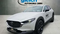 Satinweiß Gebraucht 2024 Mazda CX-30 Homura-Line SUV | 25.900 € (Fairer Preis)
