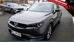 Grau machine grey Gebraucht 2023 Mazda MX30 Makoto SUV | 26.989 € (Fairer Preis)