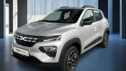 Gebraucht Dacia Spring Essentiel 33 kW (45 PS) 2023 Diamantsilbergrau (grau) Kleinwagen