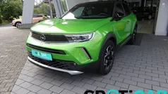 Grün (matcha grün metallic) Gebraucht 2022 Opel Mokka-e Ultimate SUV | 21.950 € (Fairer Preis)