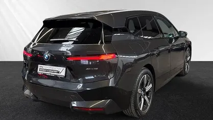 Gebraucht BMW iX Sport Line 384 kW (523 PS) 2024 Sophistograu brillanteffekt metallic SUV