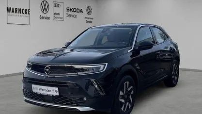 Gebraucht Opel Mokka-e Elegance 100 kW (136 PS) 2021 Diamant schwarz/karbon schwarz SUV