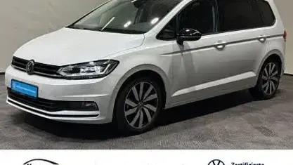 Second-hand VW Touran Highline 150 CP (110 kW) 2025 Alb Monovolum