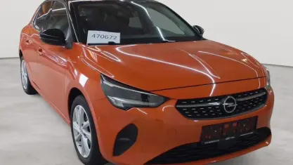 Gebraucht Opel Corsa Elegance 75 PS (55 kW) 2023 Dynamik orange metallic/dach karbon schwarz metallic Kleinwagen