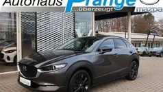 Machine gray Gebraucht 2024 Mazda CX-30 Homura-Line SUV | 27.985 € (Fairer Preis)