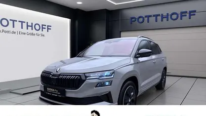 Grau Gebraucht 2024 Skoda Karoq SportLine SUV | 34.777 € (Guter Preis)