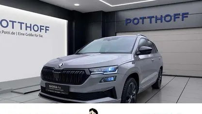Grau Gebraucht 2024 Skoda Karoq SportLine SUV | 33.443 € (Superpreis)