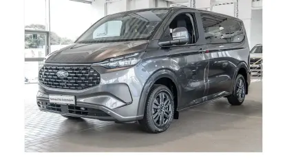 Gebraucht Ford Tourneo Custom Titanium 233 PS (171 kW) 2024 Grau Van