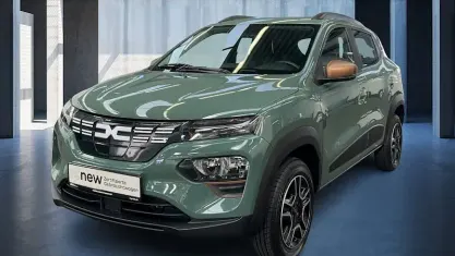 Gebraucht Dacia Spring Extreme 47 kW (65 PS) 2023 Olivgrün Kleinwagen