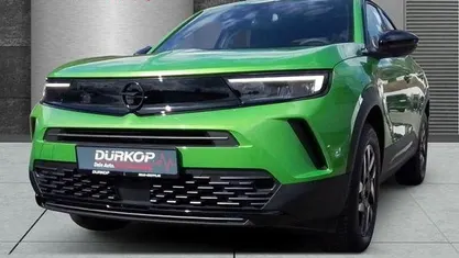 Lackierung matcha green/typ au Gebraucht 2024 Opel Mokka SUV | 23.990 € (Fairer Preis)