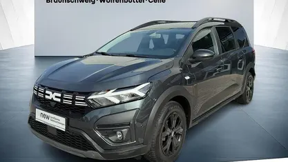 Gebraucht Dacia Jogger Extreme 110 PS (80 kW) 2023 Kometengraumetallic (grau) Van / Kleinbus