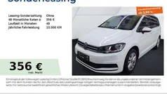 Weiß (pure white) Gebraucht 2024 VW Touran Comfortline Van / Kleinbus | 33.440 € (Fairer Preis)