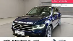Atlantic blue (metallic) Gebraucht 2024 VW Tiguan Allspace Elegance SUV | 42.799 € (Guter Preis)