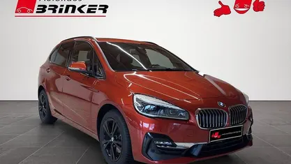 Gebraucht BMW 220 Active Tourer Luxury Line 192 PS (141 kW) 2019 Sunset orange metallic Van / Kleinbus