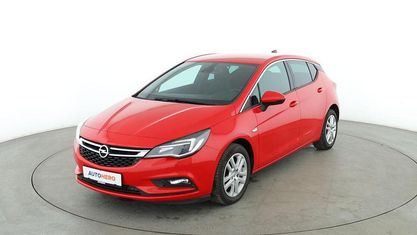 Używany Opel Astra Dynamic 125 KM (91 kW) 2016 Czerwony Sedan/Limuzyna