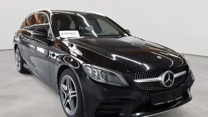 Gebraucht Mercedes C220 AMG line 194 PS (142 kW) 2020 Obsidianschwarz metallic Kombi