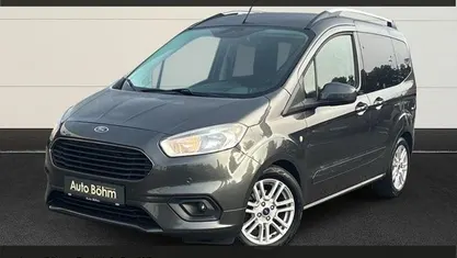 Grau Gebraucht 2021 Ford Tourneo Courier Titanium Van / Kleinbus | 18.260 € (Teuer)