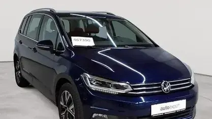 Second-hand VW Touran Highline 150 CP (110 kW) 2020 Albastru Monovolum