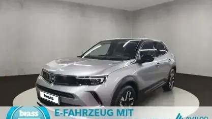 Gebraucht Opel Mokka-e Elegance 100 kW (136 PS) 2022 Kontrast grau / quarz silber SUV