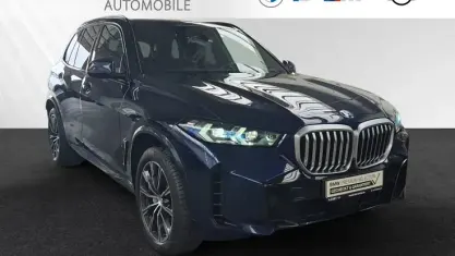 Gebraucht BMW X5 M Sport 381 PS (280 kW) 2024 Bmw individual tansanitblau metallic SUV