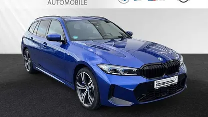 Gebraucht BMW 330e M Sport 292 PS (214 kW) 2024 Portimao blau metallic Kombi