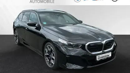 Gebraucht BMW i5 M Sport 442 kW (601 PS) 2024 Saphirschwarz metallic Kombi