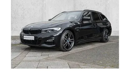Gebraucht BMW 320e Performance 204 PS (150 kW) 2022 Schwarz Kombi