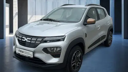 Gebraucht Dacia Spring Extreme 47 kW (65 PS) 2024 Diamantsilbergrau Kleinwagen