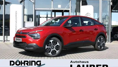 Elixirrot Gebraucht 2024 Citroën C4 PureTech Limousine | 18.750 € (Fairer Preis)