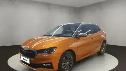 Gebraucht Skoda Fabia Style 110 PS (80 kW) 2022 Phoenixorange premium metallic / graphitegrau metallic Kleinwagen