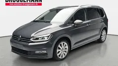 Grau Gebraucht 2024 VW Touran Highline Van / Kleinbus | 34.890 € (Fairer Preis)