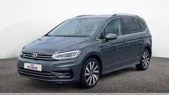 Grau Gebraucht 2024 VW Touran Highline Van / Kleinbus | 36.298 € (Fairer Preis)