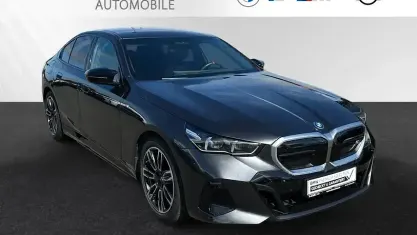 Gebraucht BMW i5 M Sport 442 kW (601 PS) 2024 Sophistograu brillanteffekt metallic Limousine