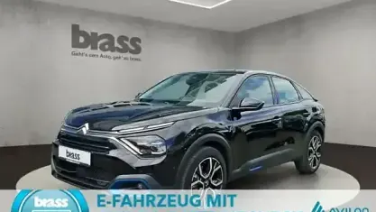 Używany Citroën e-C4 Feel 100 kW (136 KM) 2022 Czarny Sedan/Limuzyna