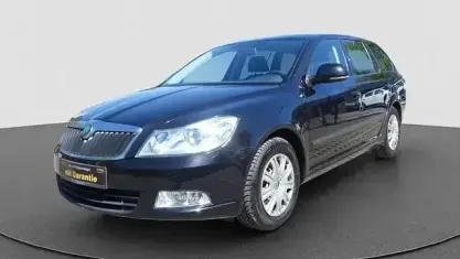 Używany Skoda Octavia Ambition 122 KM (89 kW) 2012 Czarny Kombi