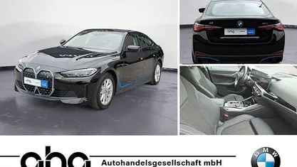 Second-hand BMW i4 Sport Line 250 kW (340 CP) 2023 Negru Berlinǎ
