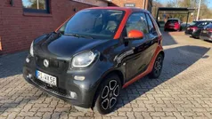 Schwarz (bodypanels in black / lava orange) Gebraucht 2019 Smart ForTwo Electric Drive Prime Cabrio | 11.199 € (Fairer Preis)