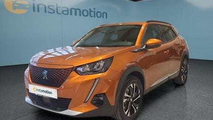 Gebraucht Peugeot e-2008 Allure 100 kW (136 PS) 2021 Orange SUV