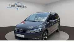 Grau Gebraucht 2022 VW Touran Highline Van / Kleinbus | 28.849 € (Guter Preis)