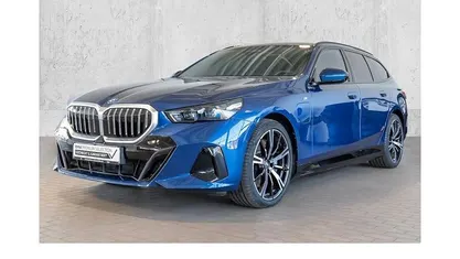 Occasion BMW 550e M Sport 489 PK (359 kW) 2025 Blauw Stationwagen