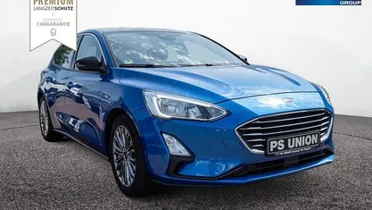 Gebraucht Ford Focus Titanium 150 PS (110 kW) 2018 Blau / dynamic blau (metallic) Limousine