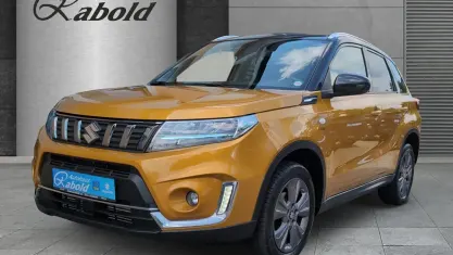 Gebraucht Suzuki Vitara Comfort 140 PS (102 kW) 2022 Solar yellow / cosmic black (gelb) SUV