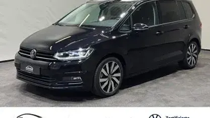 Gebraucht VW Touran Highline 150 PS (110 kW) 2025 Oryxweiß perlmutteffekt Van / Kleinbus